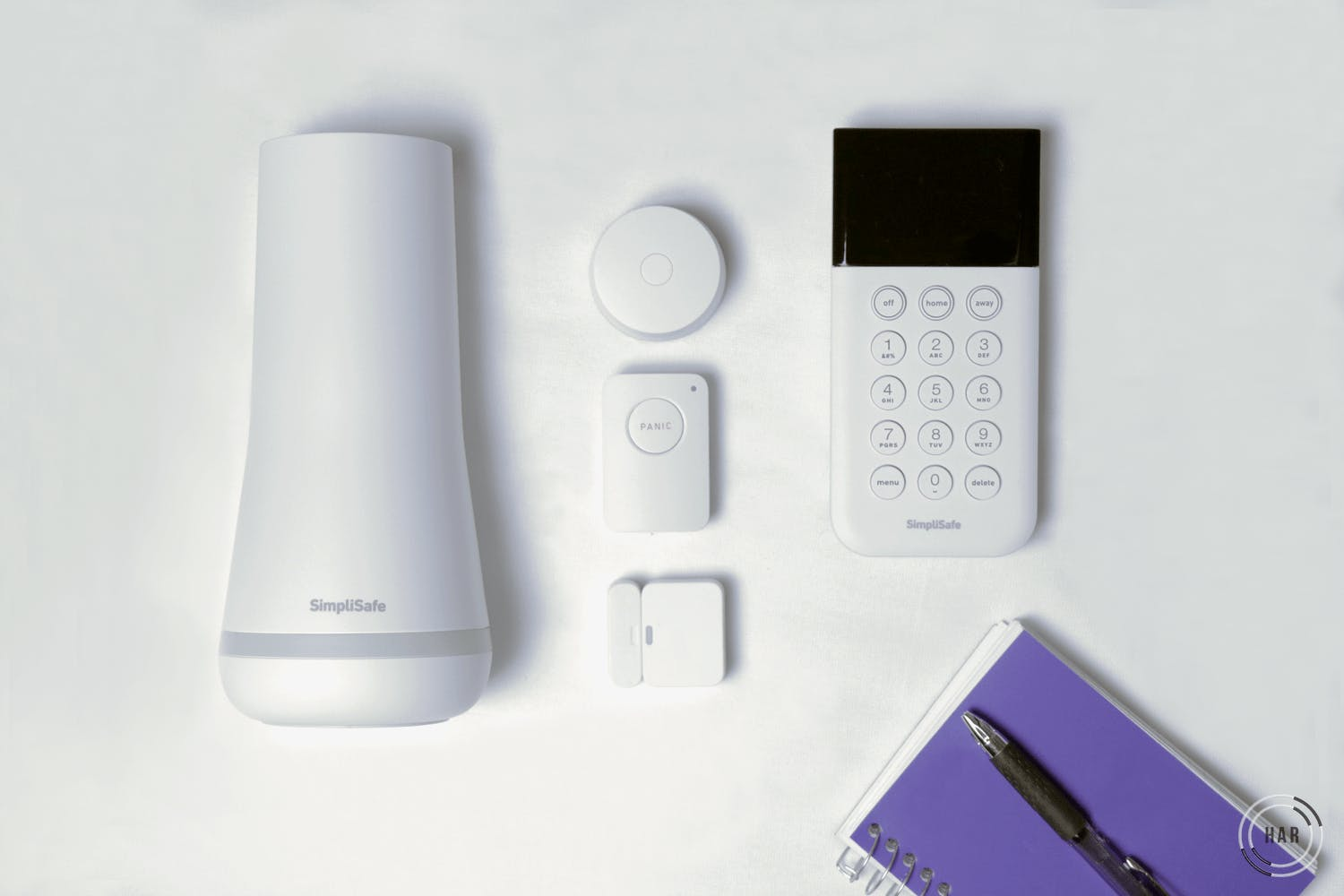 Simplisafe Base Station, motion sensor, entry sensor, panic button and water sensor. Simplisafe Base Station, motion sensor, entry sensor, panic button and water sensor.