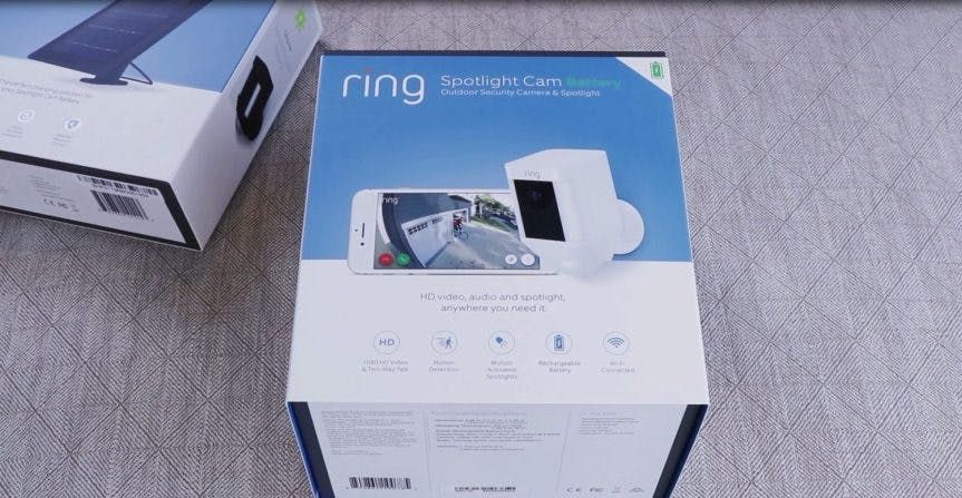 A box of Ring Spotlight Cam Battery and Solar Panel A box of Ring Spotlight Cam Battery and Solar Panel