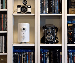 Piper security camera in the CD rack. Piper security camera in the CD rack.