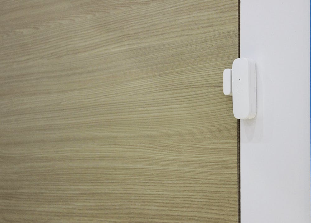 Ooma door/window sensor installed on the wall. Ooma door/window sensor installed on the wall.