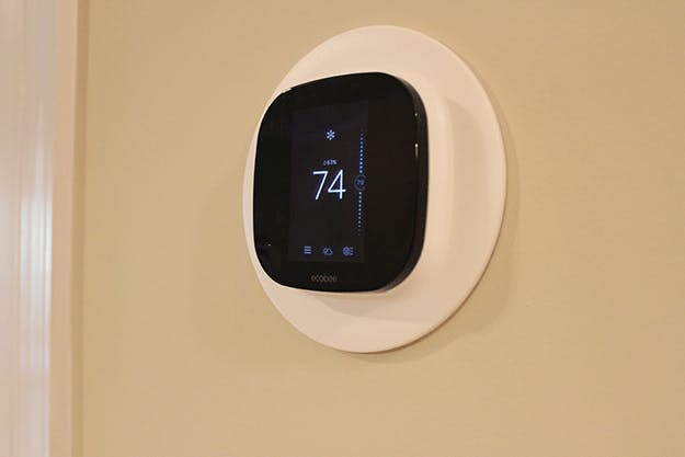 ecobee4 Smart Thermostat installed on the wall. ecobee4 Smart Thermostat installed on the wall.