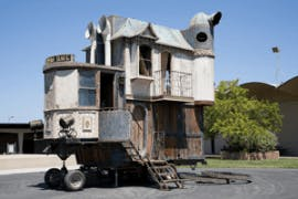Neverwas Haul, a self-propelled 3-story Victorian House. Neverwas Haul, a self-propelled 3-story Victorian House.